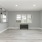 spacious room that connects to the kitchen