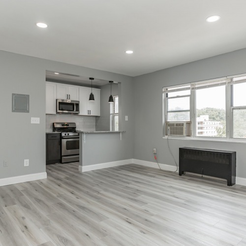 Living Spaces Suited For You living room with large windows